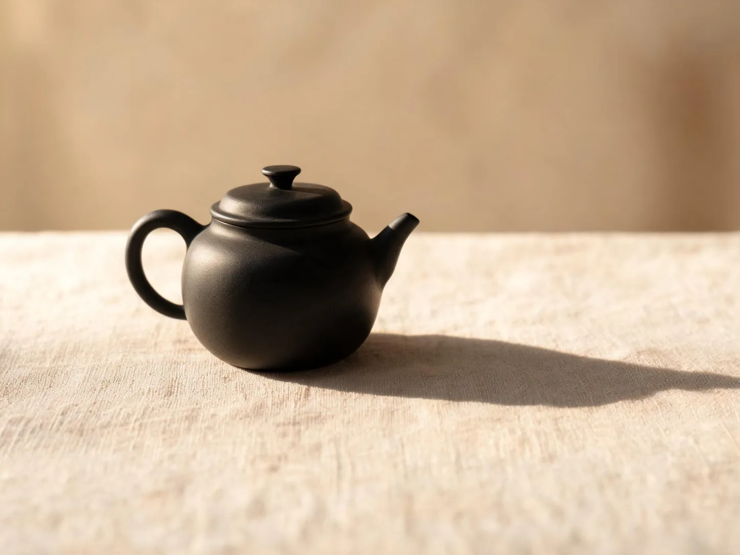 A ceramic mug on a pale oak table in soft window light, generated from a prompt
