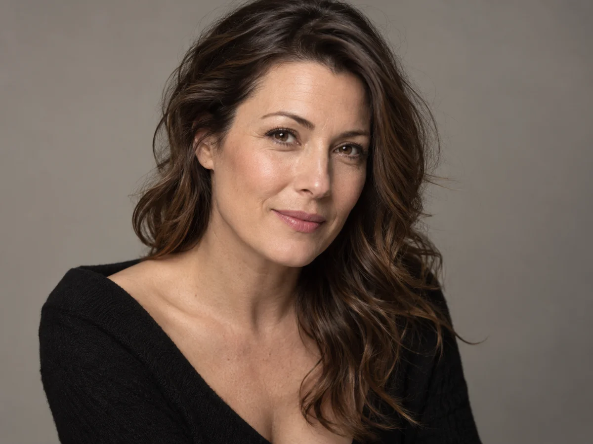 Softly lit studio portrait with natural skin texture left intact